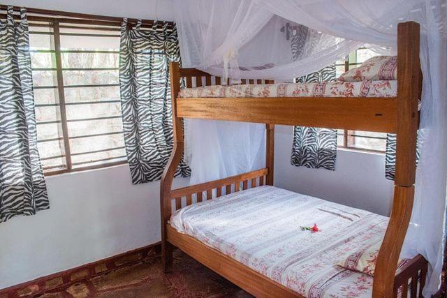 Kijani Cottages Diani 디아니 해변 외부 사진